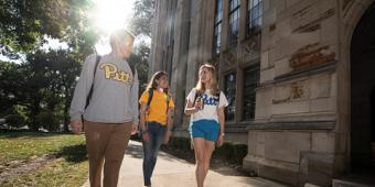 Image of undergraduate students walking on campus