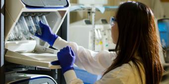 Image of a medical technologist completing a laboratory test